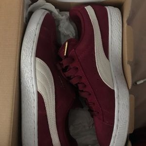 Burgundy pumas